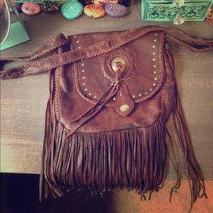 All genuine leather purse.  Braids braids braids